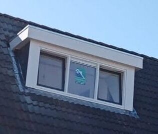 dakkapel met plat dak plaatsen